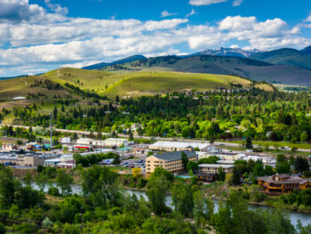 View looking down at Missoula, Montana, and the river where you can enjoy the best things to do in Missoula.