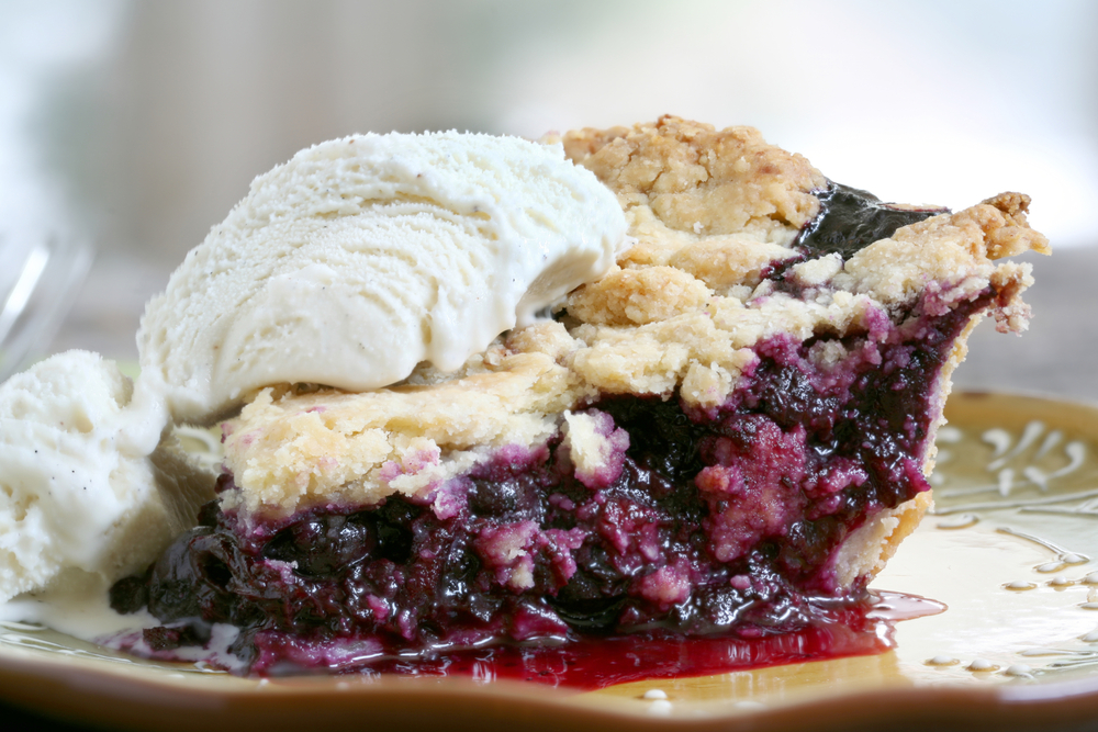 Blueberry pie with ice cream.
