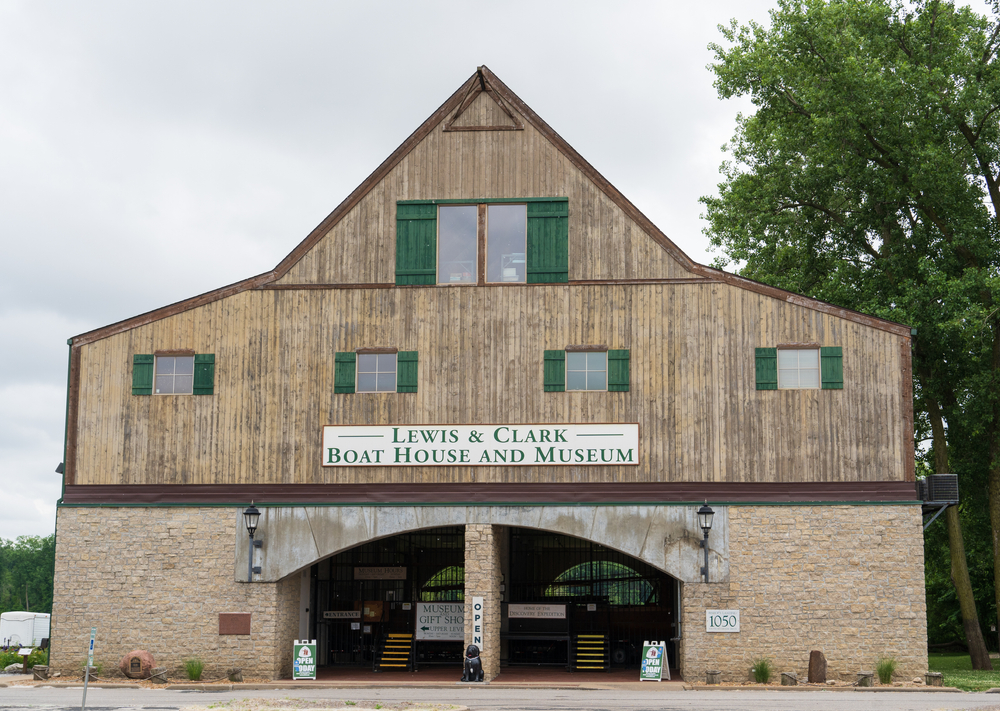 The front of the Lewis & Clark Boathouse and Museum with wooden top and stone bottom.