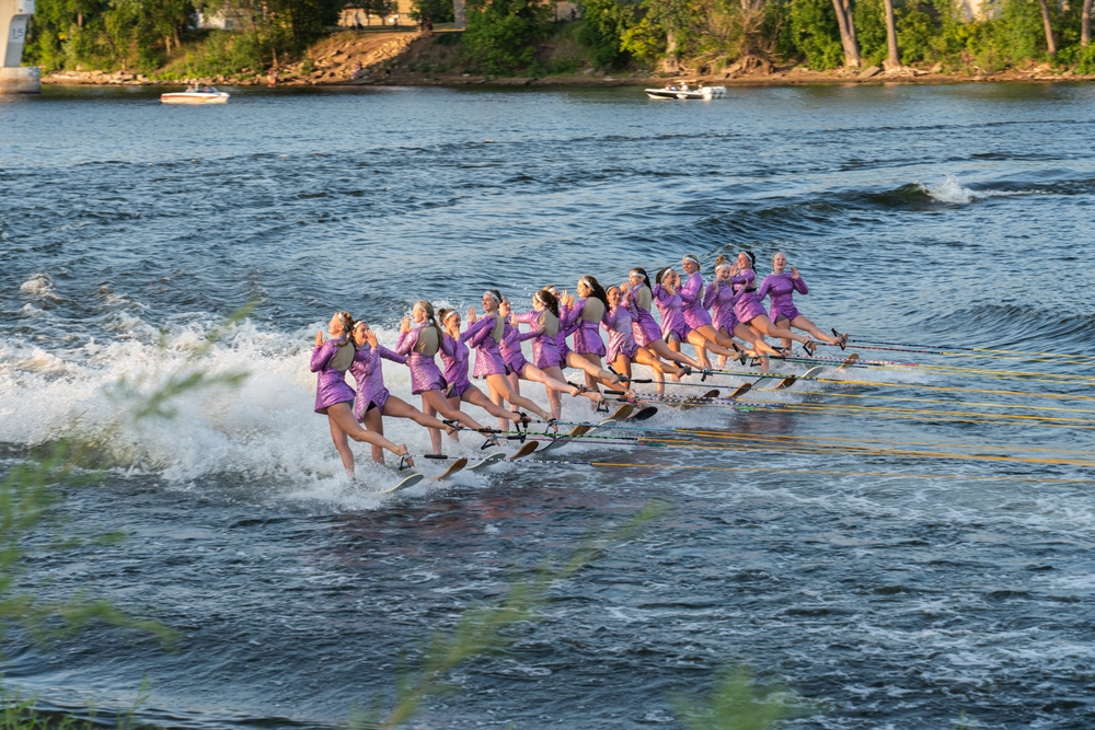 Water skiers performing on the Mississippi River during the Minneapolis Aquatennial.