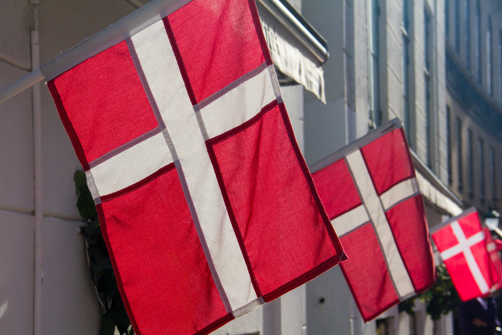 A row of Danish flags on a building