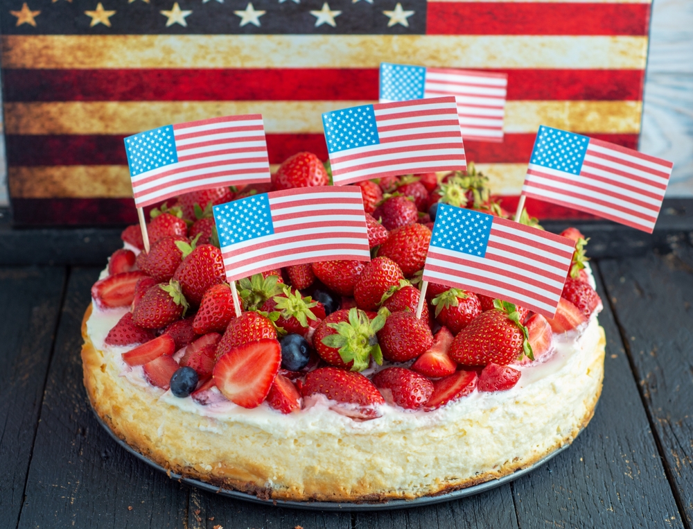 traditional strawberry cheesecake and american patriotic breakfast table,