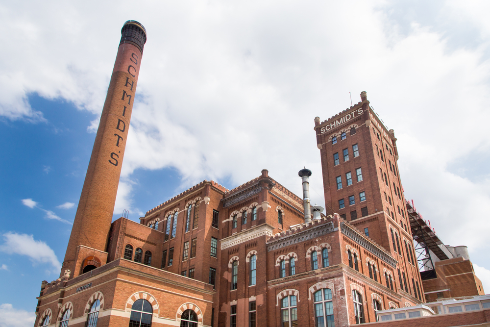 The historic Schmidt's Brewery brick building on a sunny day