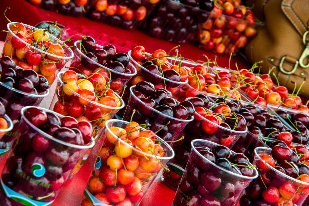 Glasses of cherries of different colors