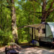 Camping trailer at a campsite in Starved Rock State Park, offering the best camping in the Midwest.