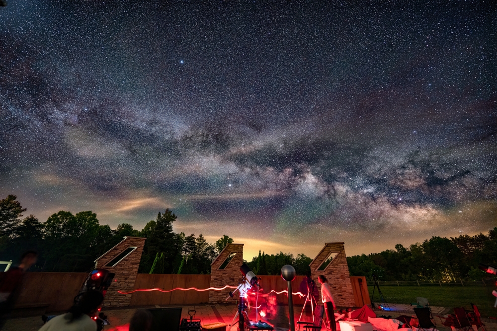 Star gazers photograph and observe the stars at John Glenn Astronomy Park.