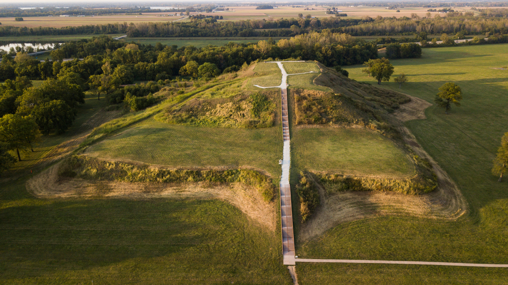 aerial view of a large earthern mound with steps attractions in illinois