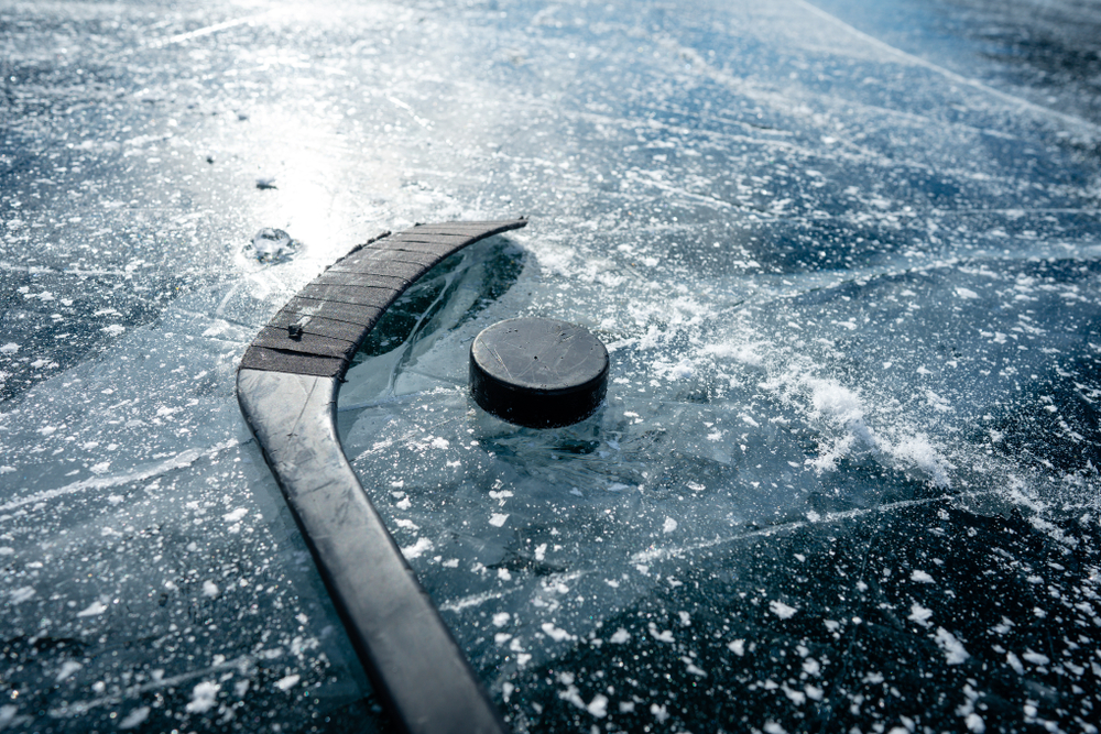 hockey puck on a frozen lake