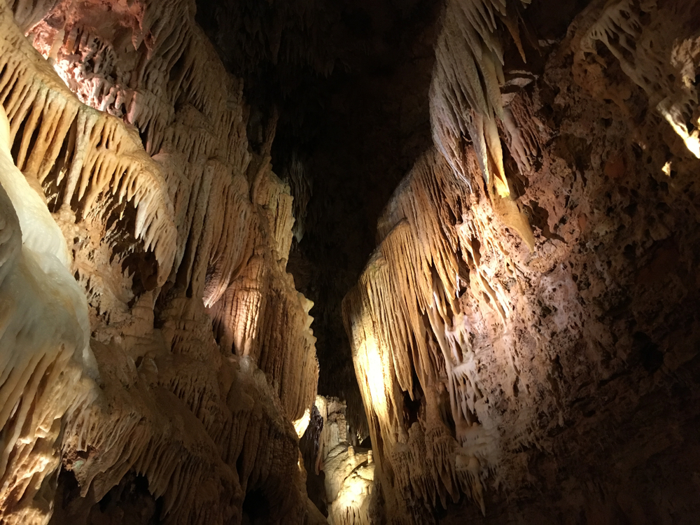 interiors of a cave with stalagmites things to do at lake of the ozarks