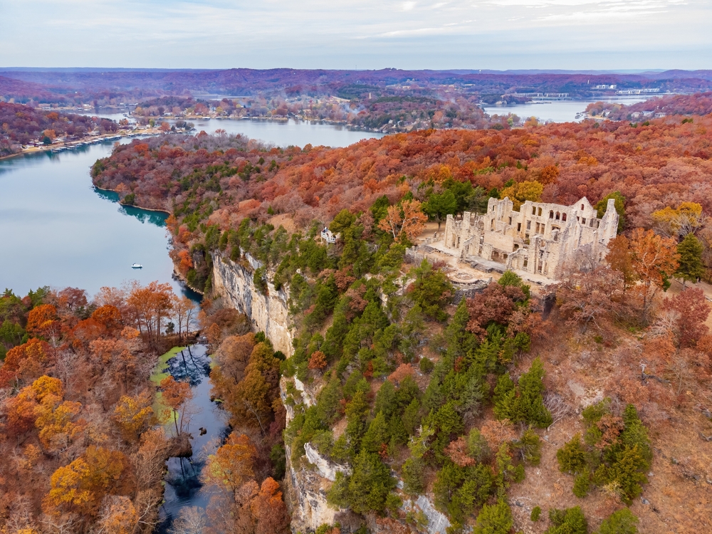 Aerial view of the fall color of Lake Ozark and the castle ruins at Missouri