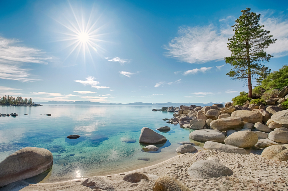 Lake Tahoe east shore beach, calm turquoise water in sunny day. One of the Beaches to Visit in the US Before You Die. 