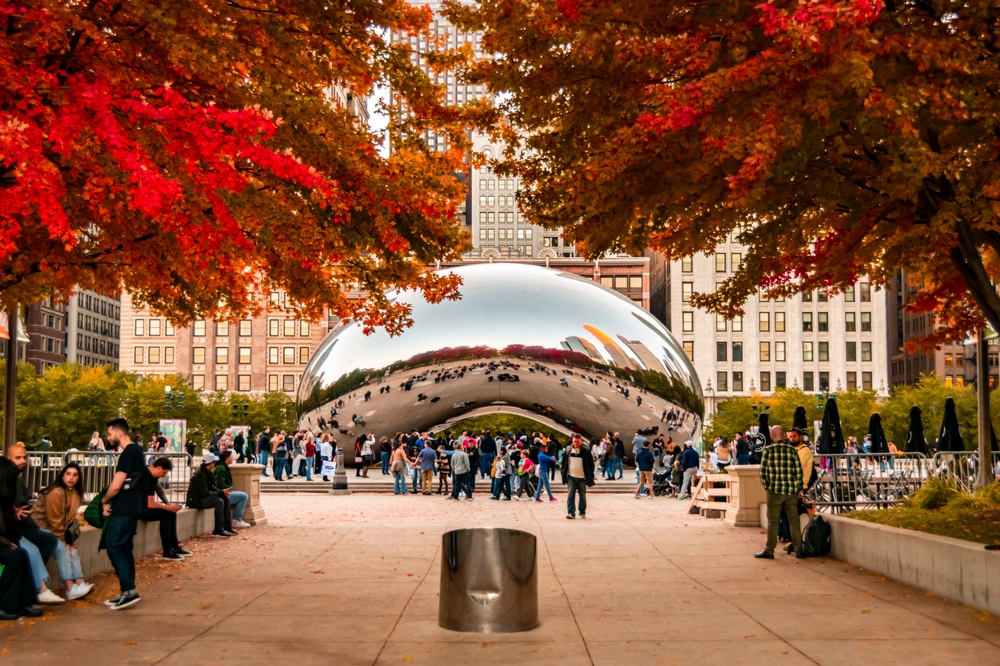 Cloud Gate, also known as the The Bean, a scuplture in Millennium Park in downtown Chicago as seen during the sunset hours of an autumn day.