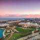 aerial view of buildings beside ocean and big grass area museums in chicago