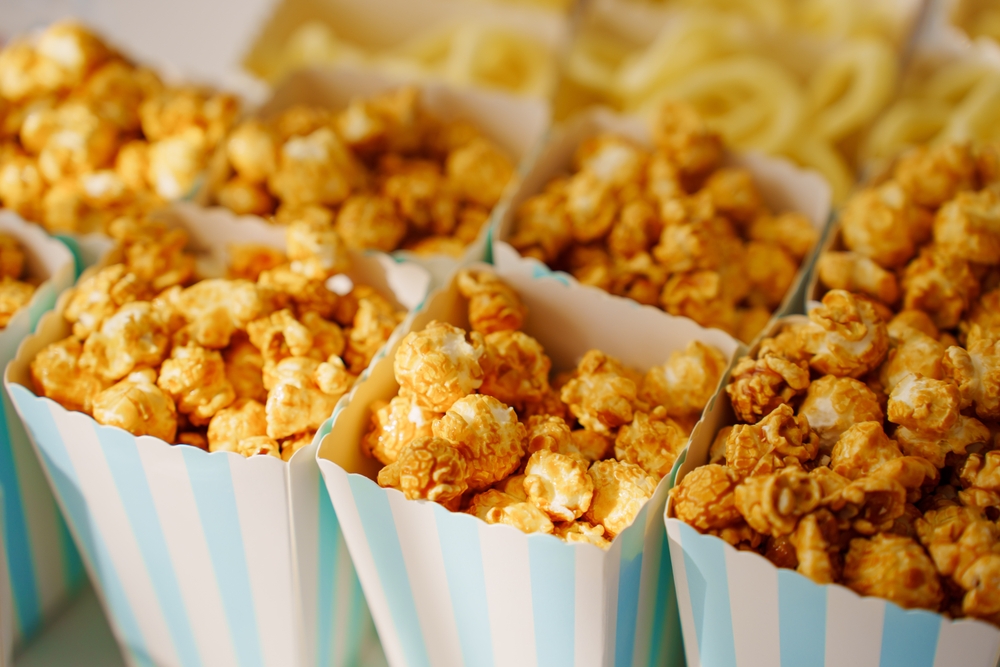 caramel popcorn in cups during a festival midwest fall festivals