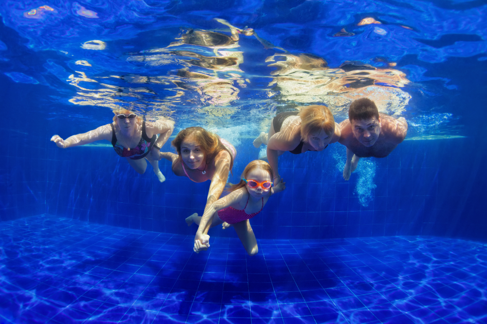 family swimming together