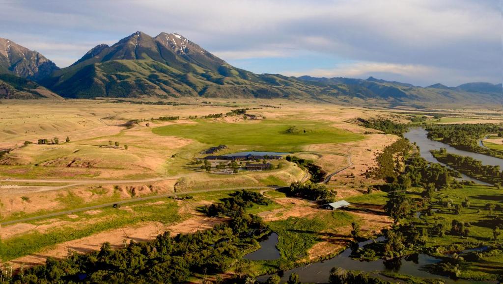 Sage Lodge taking from above with the mountains in the background.