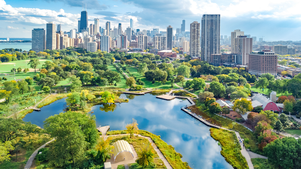 Chicago skyline aerial drone view from above, lake Michigan and city of Chicago downtown skyscrapers cityscape bird's view from park. 