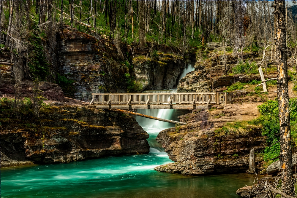 The Saint Mary Falls in the US Park showing the bridge with a waterfall. 