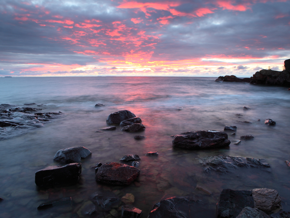 Sunrise at North shore of Lake Superior. Article is about  North Shore Minnesota. 