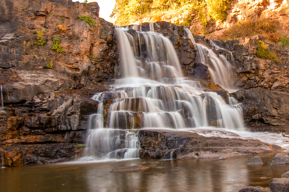 Gooseberry Falls in Duluth Minnesota along North Shore. Article is about  North Shore Minnesota. 